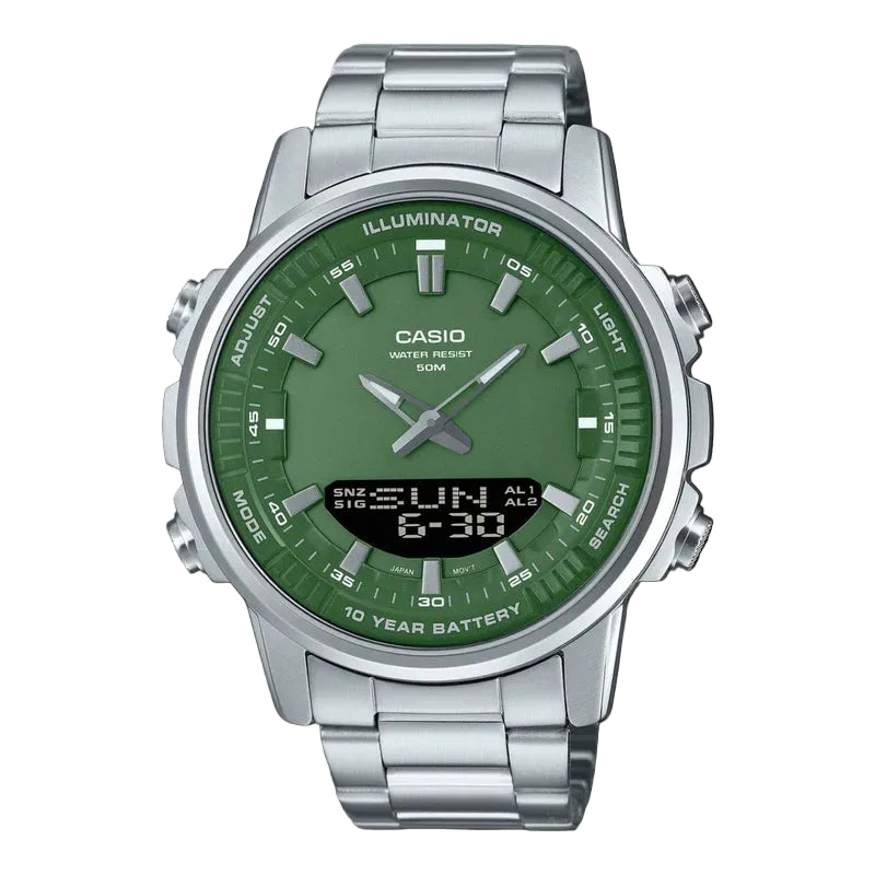 Casio watch with green face and silver metal strap on black background