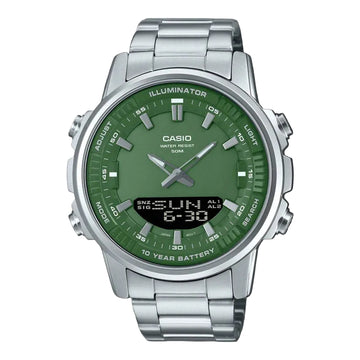 Casio watch with green face and silver metal strap on black background